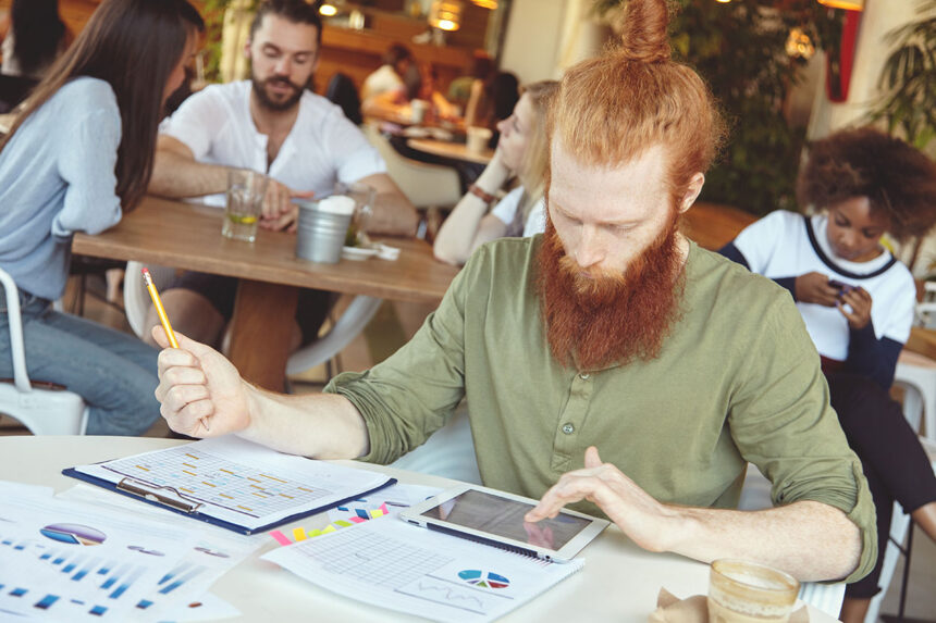 Founders reviewing financial estimates on a laptop